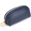 A dark blue leather key organizer wallet with a gold zipper closure.