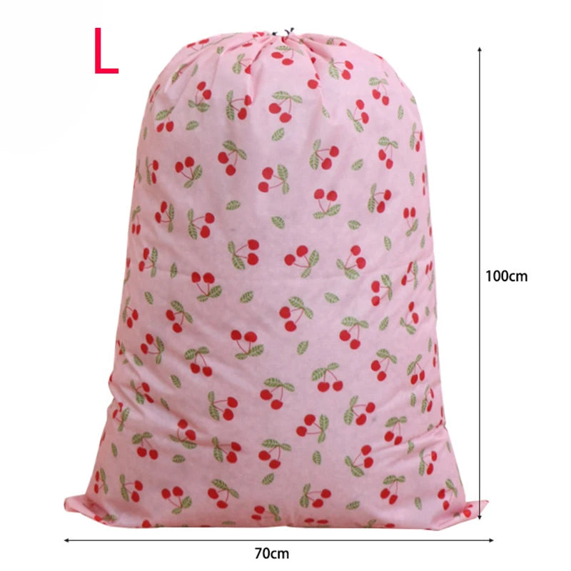 Pink drawstring storage bag with a cherry pattern, measuring 100cm high and 70cm wide.