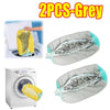 Two grey laundry bags for shoes shown next to a washing machine.