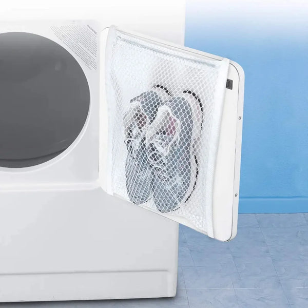 A white shoe drying net is shown open next to a dryer door, featuring a decorative pattern.