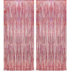 A vertical backdrop featuring shimmering rose gold foil tinsel fringe curtains.