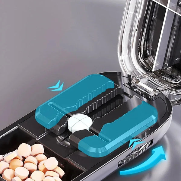 A portable pill cutter and organizer set with loose pills visible in the foreground.