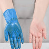 A hand wearing a blue nitrile disposable glove is shown against a gray background.