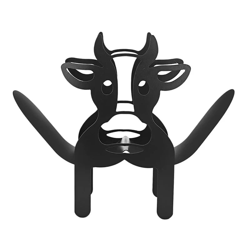 Black novelty animal toilet paper holder and storage rack shaped like a bull's head