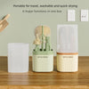 A set of portable silicone bottle brushes and a drying rack displayed on a wooden surface.
