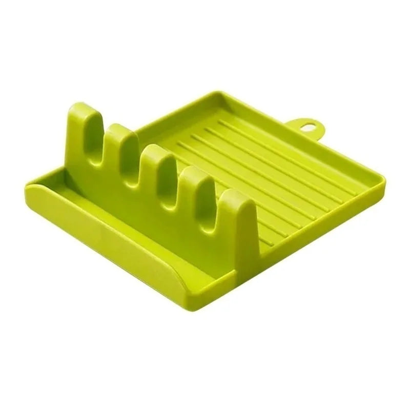 A bright lime green kitchen utensil holder with multiple slots for spoons and other tools.