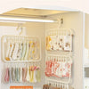 A large capacity multi-clamp storage rack for socks, showing various pairs of socks neatly organized on multiple layers.