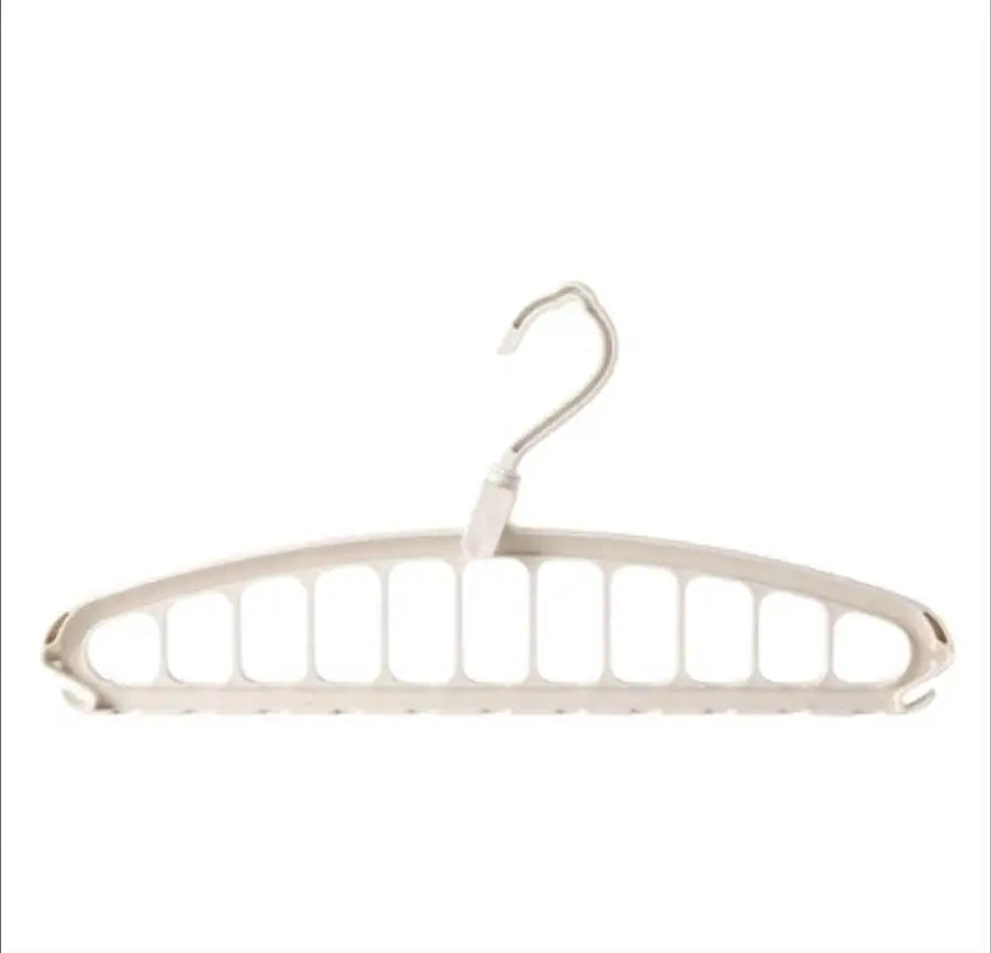 A white plastic multi-layer hanger with a hook and multiple bars for hanging clothes.
