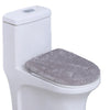 A white toilet with a gray protective seat cover installed.
