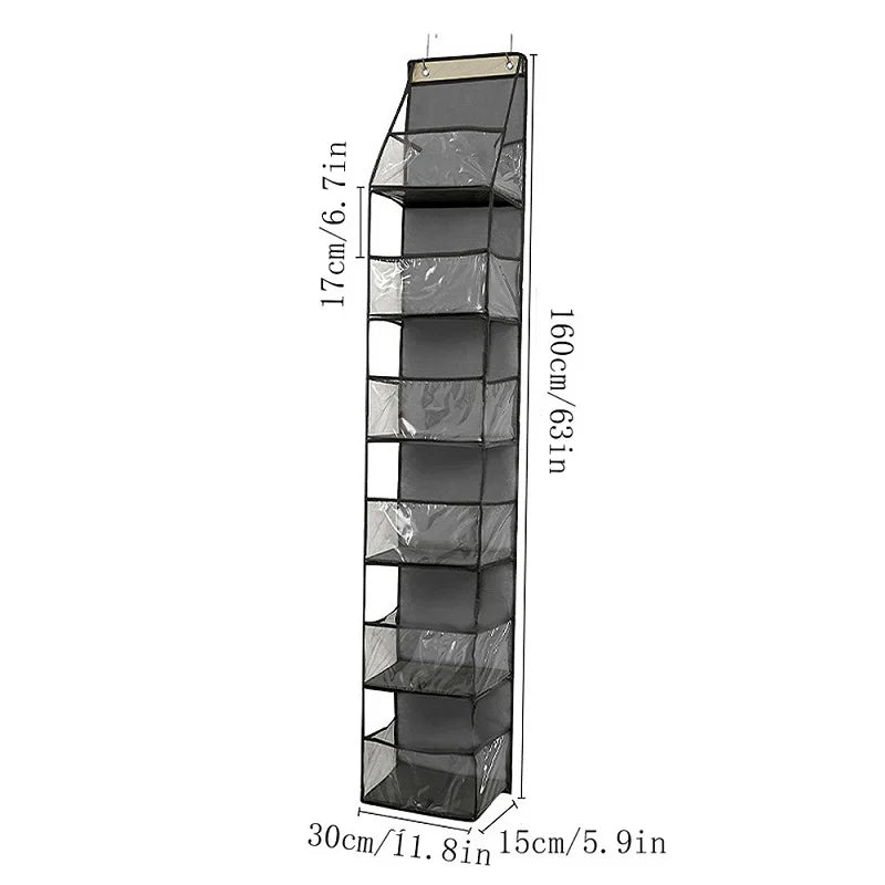 A tall, rectangular over-the-door fabric storage organizer with multiple pockets and adjustable height markings.