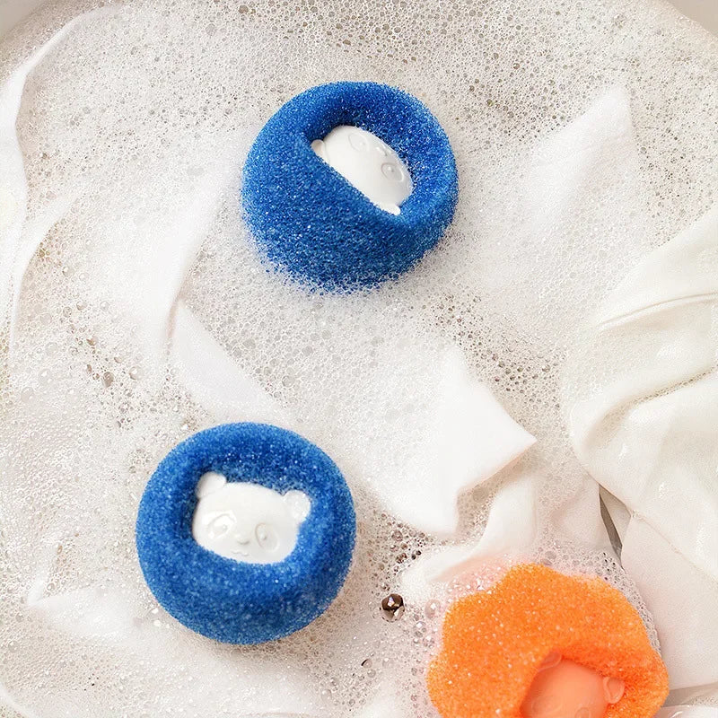 Blue and orange reusable pet hair and lint remover balls with white foam inserts