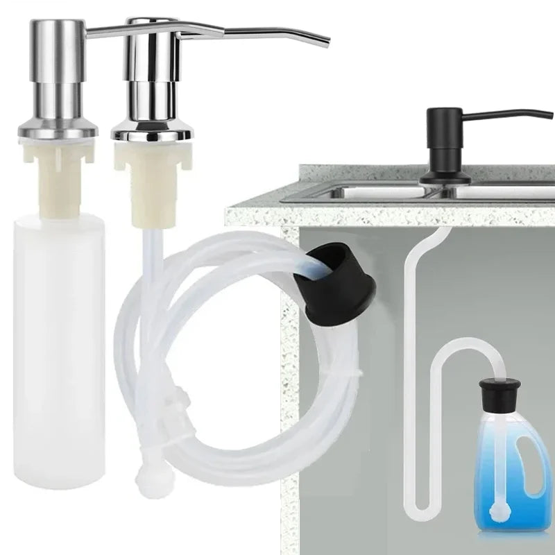 Under-sink kitchen soap dispenser with a metal faucet and clear tubing for washing dishes.