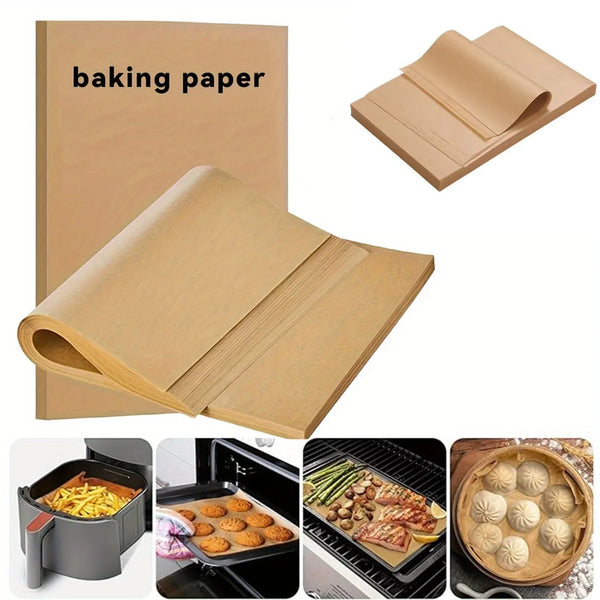Rolls of non-stick baking paper shown alongside various cooking applications like baking and grilling.