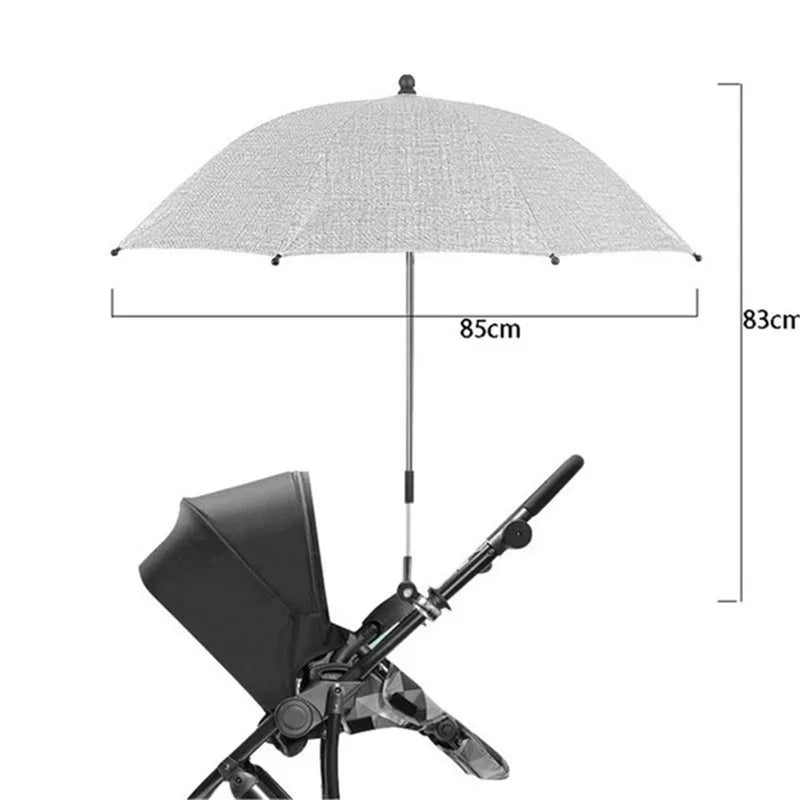 Paraguas de cochecito gris con protección UV, gran toldo y soporte plegable.