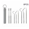 An 8 piece stainless steel reusable toothpick set with a cap and various pick shapes
