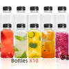 A set of ten clear glass juice bottles filled with various colored juices and liquids.