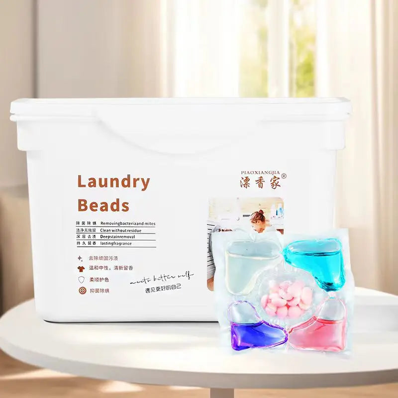 A white container of Laundry Beads with various colored beads and a label in English and Chinese.