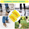 Yellow shoe cleaning bag being used to quickly clean muddy shoes.