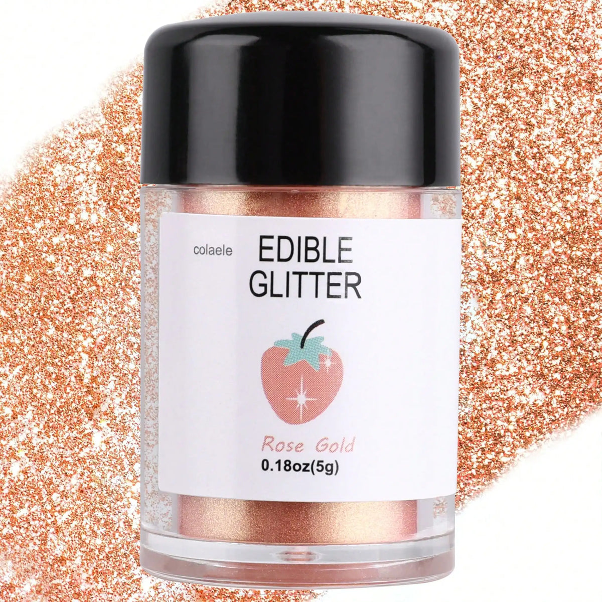 A glass jar of edible glitter powder in rose gold color with a strawberry illustration against a background of orange glitter