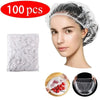 A woman is shown wearing a clear reusable disposable shower cap for hair protection, with a separate pack of the same product