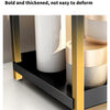 A black and gold two-tier iron art desktop storage rack displaying cylindrical objects.