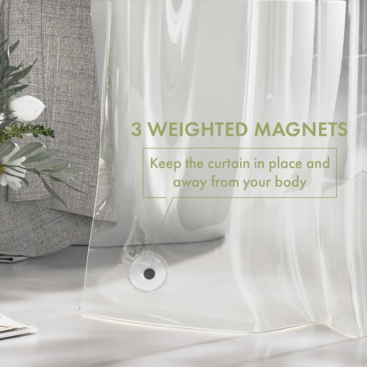 Crystal clear shower curtain with weighted magnets keeping the fabric in place and away from the body