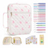 A white floral quilted Bible cover bag with a zipper and handle, shown alongside various colored pencils.
