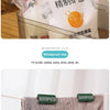A set of green and pink windproof clips used to fix towels, clothes, socks, skirts, and pants onto a fabric.