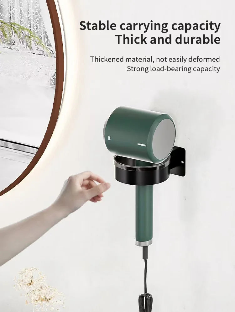 Support de séche-cheveux mural avec une tête cylindrique vert foncé et un long col, sur un mur blanc.