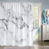 White marble abstract fluid texture shower curtain hanging in a bathroom