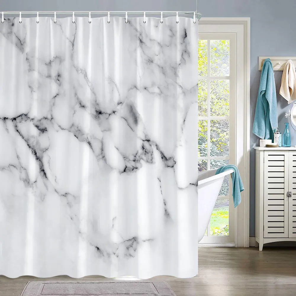 White marble abstract fluid texture shower curtain hanging in a bathroom