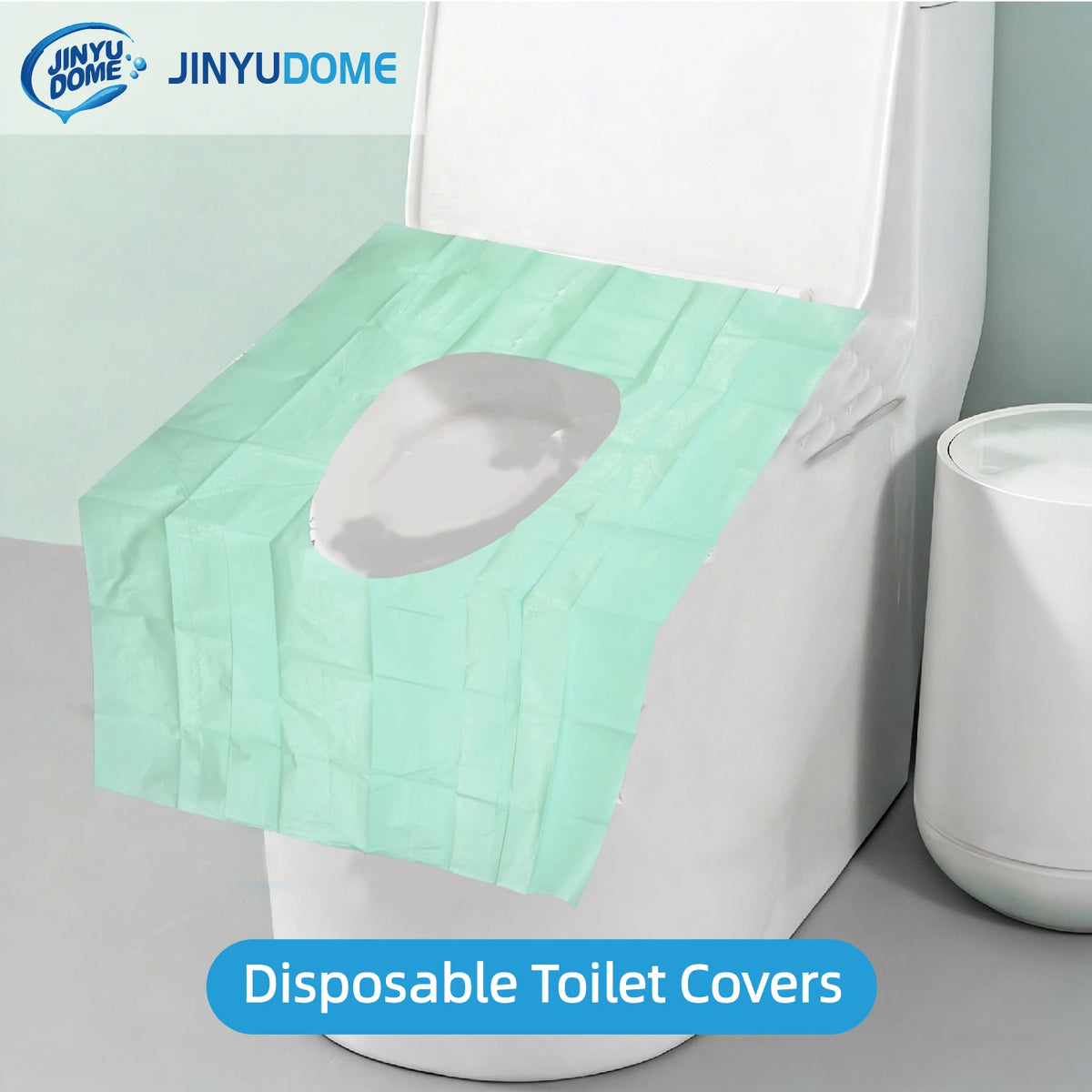 A disposable light green toilet cover placed on a white toilet bowl.
