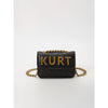 Black quilted magnetic crossbody bag with gold chain and letter flap