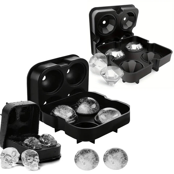 Black silicone ice cube molds with lids and several clear ice cubes