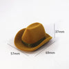 A tan velvet cowboy hat with a black beaded band shown from the side, with dimensions provided.