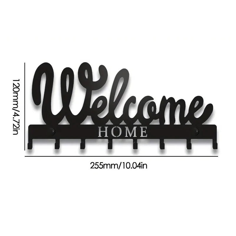 Black decorative metal key holder rack with hooks featuring the word Welcome Home