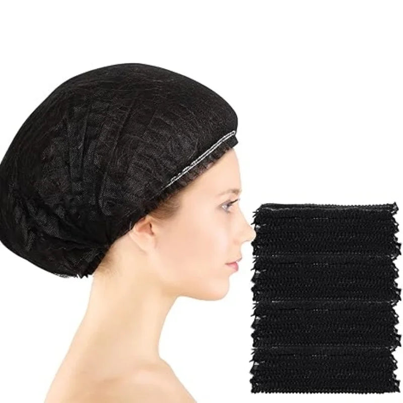 A black disposable bouffant hair net cover is shown on a person's head.