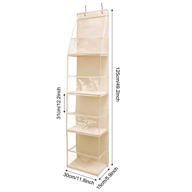 A tall, rectangular beige fabric storage organizer with multiple pockets hanging from a hook.