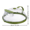 Clear microwave splatter cover with a green handle and water steamer component.