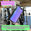 A purple silicone suction cup phone stand is shown in a gym setting, used for hands-free viewing.
