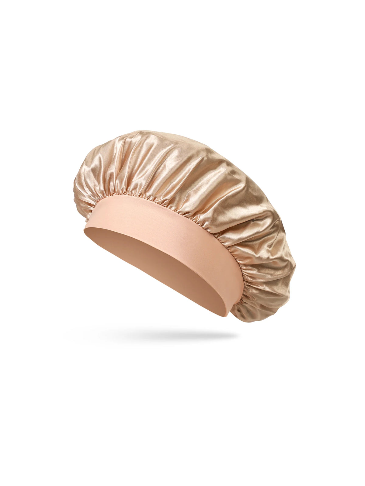 A light pink satin sleep bonnet for a toddler, shown from the side.