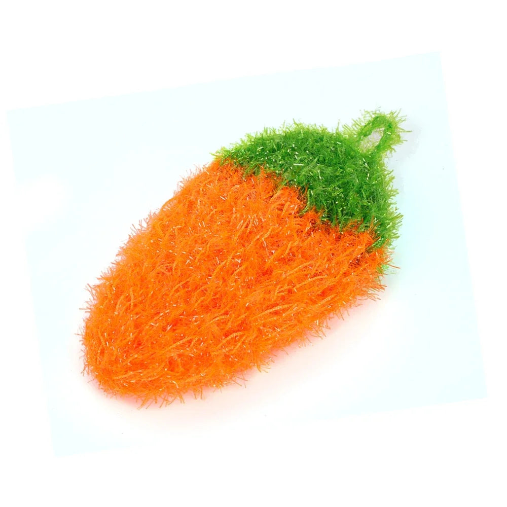 An orange strawberry scrubber sponge with green leafy top resting on a white background.
