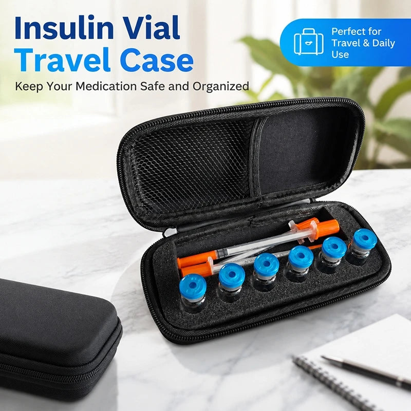 An open black vial travel case containing several small orange and blue peptide vials on a white marble surface.