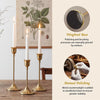 Set of six gold weighted metal taper candlestick holders with polished and brushed finishes