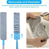 A hand is using a gray microfiber cloth to clean a surface in a sink, demonstrating its removable and washable features.