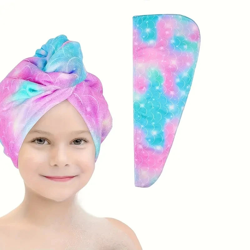 A pink and blue microfiber hair drying cap is shown next to a smiling child's face.