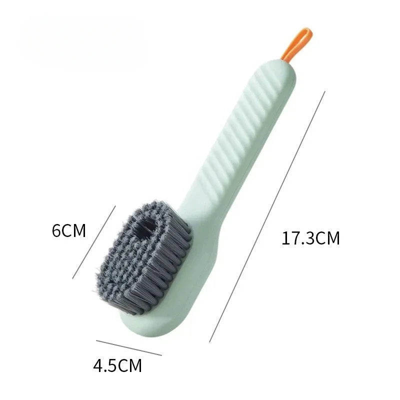 A light green multi-use shoe cleaning set featuring a brush and storage bag.