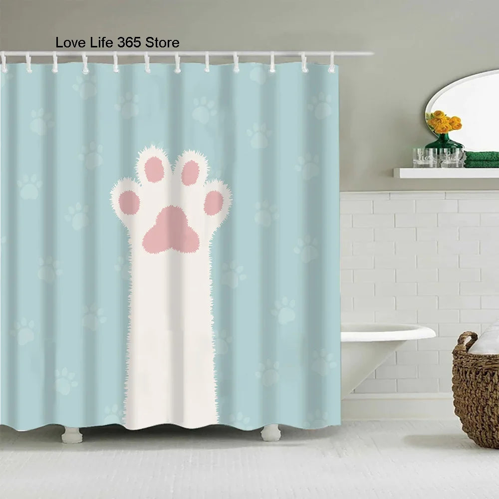 Light blue shower curtain featuring a pink paw print design for pets