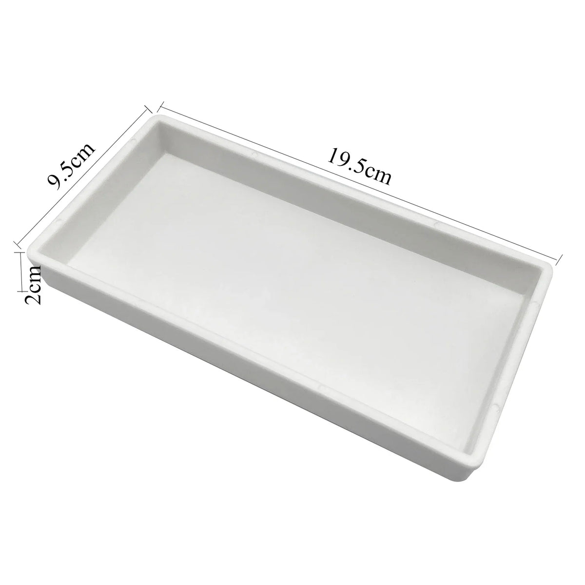 White rectangular tray organizer with dimensions 9.5cm by 19.5cm and a depth of 2cm.