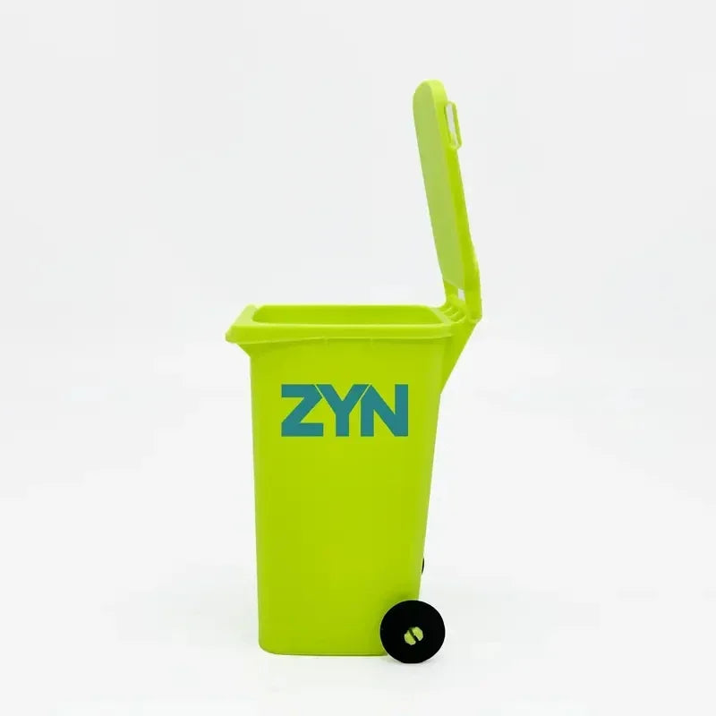 A bright lime green mini desk organizer trash can with a hinged lid and wheels.